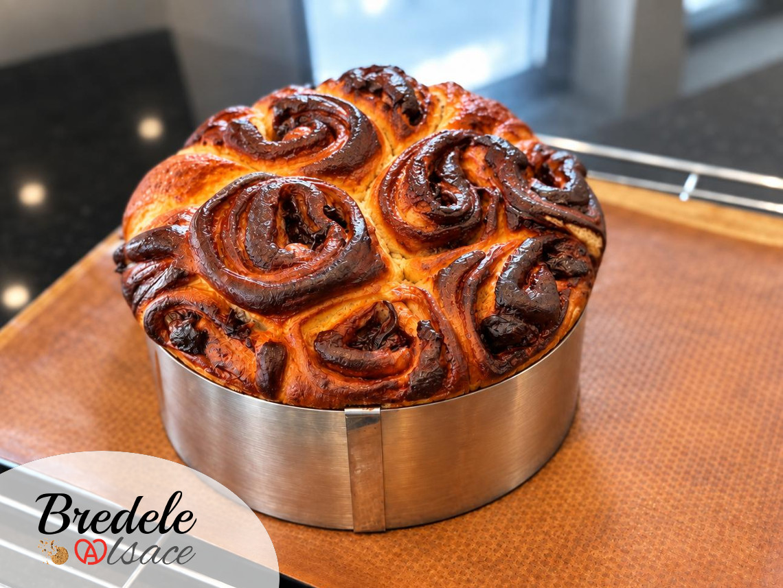 Schneckekueche aux quetsches dans un cercle à pâtisserie